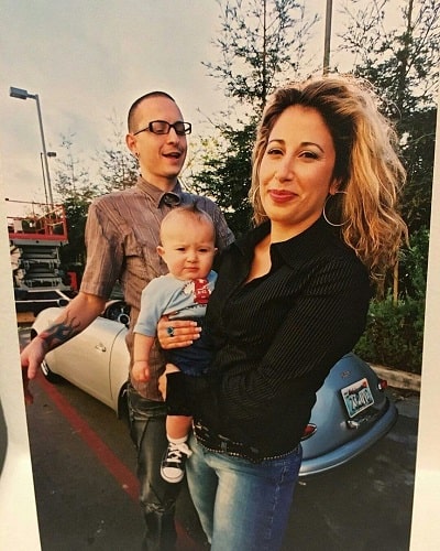 A picture of Draven with his parents when he was young.
